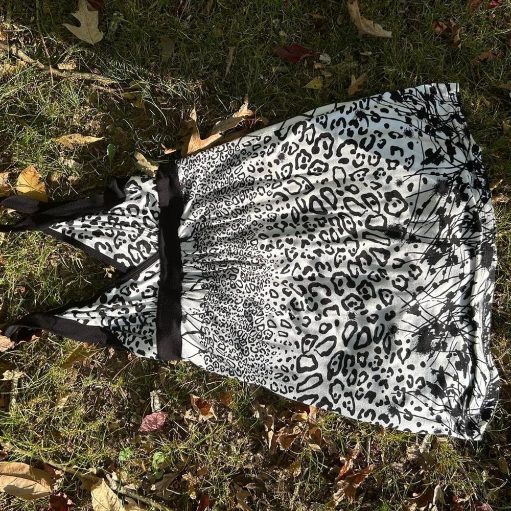 Cute black and white cotton mini dress with cross over chest and funky pattern